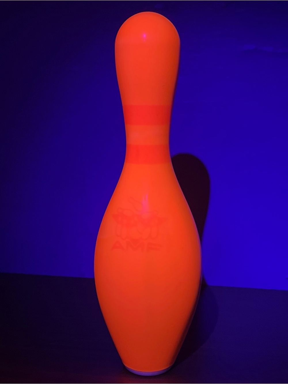 AMF 15in Bowling Pin ABC Approved Neon Orange (Black Light) Plastic Coated Wood